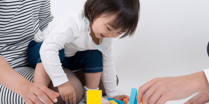 girl playing with blocks